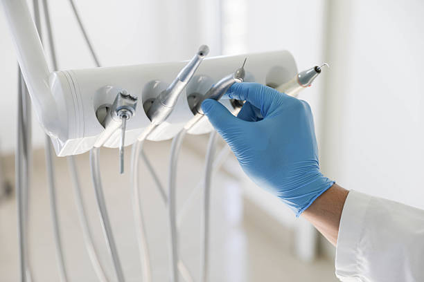 Professional Tooth Extraction technician working in Plains, KS